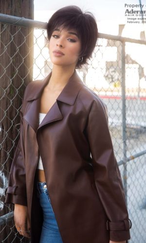 Stylish short brown wig on a woman with a leather jacket outdoors.