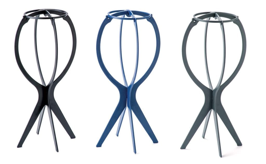 Three hair stand holders in black, blue, and gray for wig styling and display.