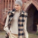 Woman wearing a Mila Turban and stylish fall clothing outdoors.