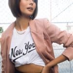 Fashion model with sleek bob wig from Hidden Secrets Wigs.