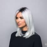 Silver ombre wig with dark roots and straight style for women.