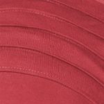 Close-up of a red wave-patterned swim cap with textured lines.
