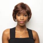Stylish short auburn wig with layered waves for a natural look.