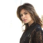 Fashion model with layered wig and lace top for Hidden Secrets Wigs.