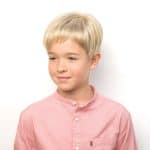 Blonde boy with short layered wig from Hidden Secrets Wigs.