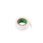 White medical tape roll with green core for medical use.