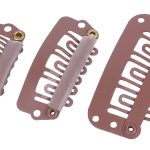 Set of three beige, black, and brown pressure-sensitive clips for wigs.