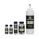 Walker Tape Ultra Hold adhesive bottles and applicator for wig bonding.