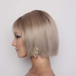 Blonde bob wig with layered style from Hidden Secrets Wigs.