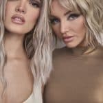 Two women with styled blonde wigs from Hidden Secrets Wigs.