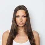 Long, straight brown wig from Hidden Secrets Wigs for natural look.