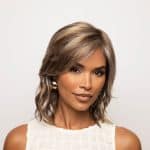 Stylish woman wearing Briar Noriko Collection wig from Hidden Secrets Wigs.