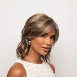 Stylish layered wig from Hidden Secrets Wigs, model wearing Briar Noriko Collection style.
