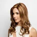 Beautiful woman wearing Brittany wig from Amore Collection at Hidden Secrets Wigs.
