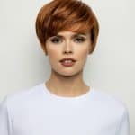 Red short bob wig from Hidden Secrets Wigs, styled for a modern look.