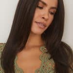 Natural straight dark brown wig with layered cut for a realistic look.