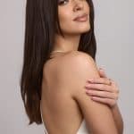 Long, straight, dark brown wig from Hidden Secrets Wigs.