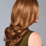 Beautiful auburn wig with soft waves for a natural look.