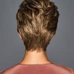Short curly wig for women with layered textured style.