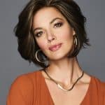 Stylish short wavy wig for women with brown highlights and layered cut.