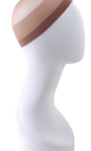 Wig cap in brown and grey on a white mannequin head.