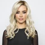 Blonde wavy wig from Hidden Secrets Wigs in Glam Wavez collection.