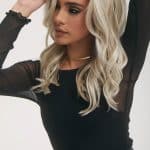 Blonde wavy wig from Hidden Secrets Wigs in Glam Wavez collection.