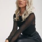 Blonde wavy wig from Hidden Secrets Wigs in Glam Wavez collection.