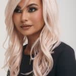 Blonde wavy wig from Hidden Secrets Wigs for glamorous looks.