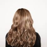 Long wavy blonde wig from Hidden Secrets Wigs for glamorous looks.