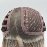 Front view of a lace front wig cap with blonde hair extensions.