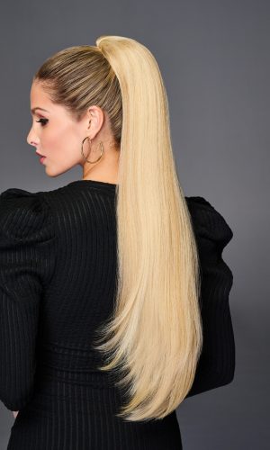Blonde straight ponytail wig styled in a high ponytail with sleek finish.