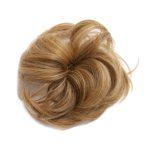 Blonde hair styled in a neat bun for elegant chignon hairstyle.