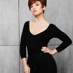 Stylish short red wig on a woman with a modern hairstyle.