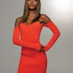 Beautiful woman with sleek, straight hair wearing a red off-shoulder dress.