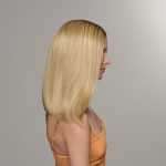 Side view of a woman with straight, sleek blonde wig.