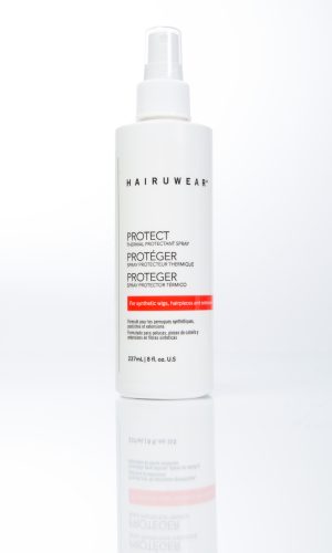 White spray bottle of PROTECT Thermal Protectant for hair styling.