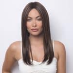 Elegant brunette wig model from Hidden Secrets Wigs for stylish looks.