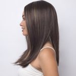 Elegant brunette wig with subtle highlights from Hidden Secrets Wigs.