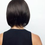 Short, sleek, dark brown wig from Hidden Secrets Wigs.