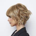 Stylish blonde layered wig from Hidden Secrets Wigs for fashion and elegance.