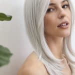 Elegant silver wig from Hidden Secrets Wigs, perfect for a sophisticated look.