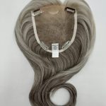 Gray wig with heart-shaped lace front for natural look and comfort.