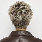 Curly silver wig for women, stylish and trendy for fashion-forward looks.