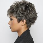 Short curly gray wig for women, stylish and modern hairpiece.
