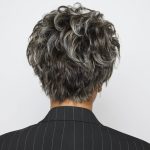 Curly, salt-and-pepper short wig for women from Hidden Secrets Wigs.