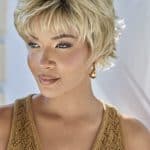 Blonde short layered wig with textured style and side-swept bangs.
