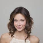 Model wearing Medium Wavy TP Mono wig from Hidden Secrets Wigs.