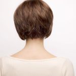 Short brown wig styled in a layered bob for a fashionable look.