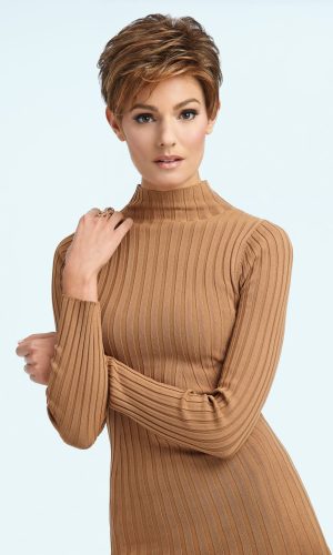 Woman with short, textured hairstyle and warm brown color.